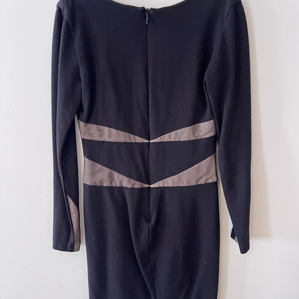 Black and tan fitted dress above the knee